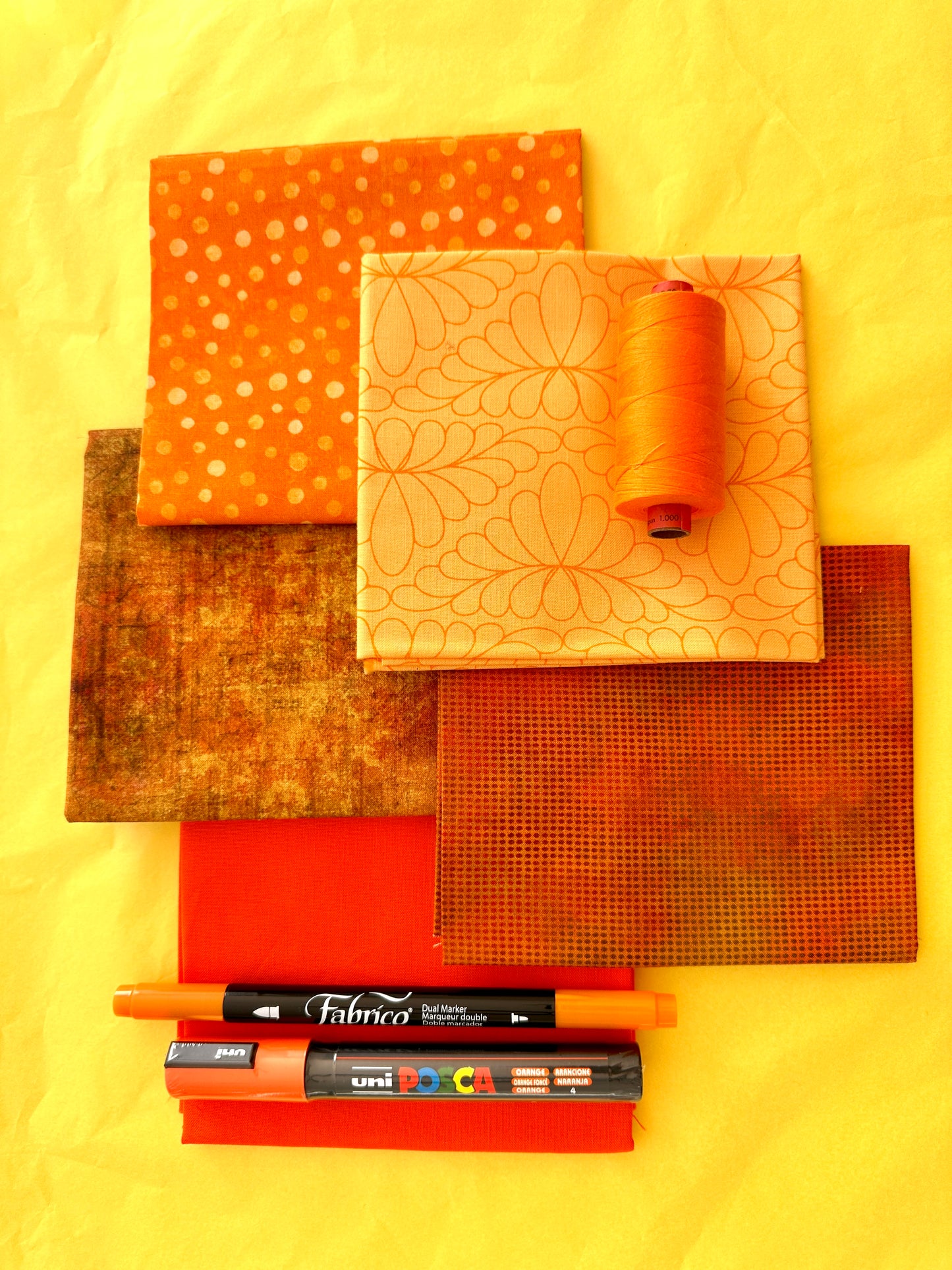 Yellow rainbow stash builder bundles of quilting fabric in fat quarters with a Posca pen and Fabrico pen and rasant thread available at 2 sew textiles art quilt supplies