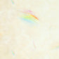 Abstract design with rainbow colors on a beige background