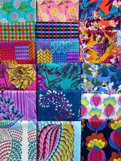 Anna Maria fat quarter bundle of 17 fabric laid out. Available from 2 sew textiles art quilt supplies. By free spirit fabrics