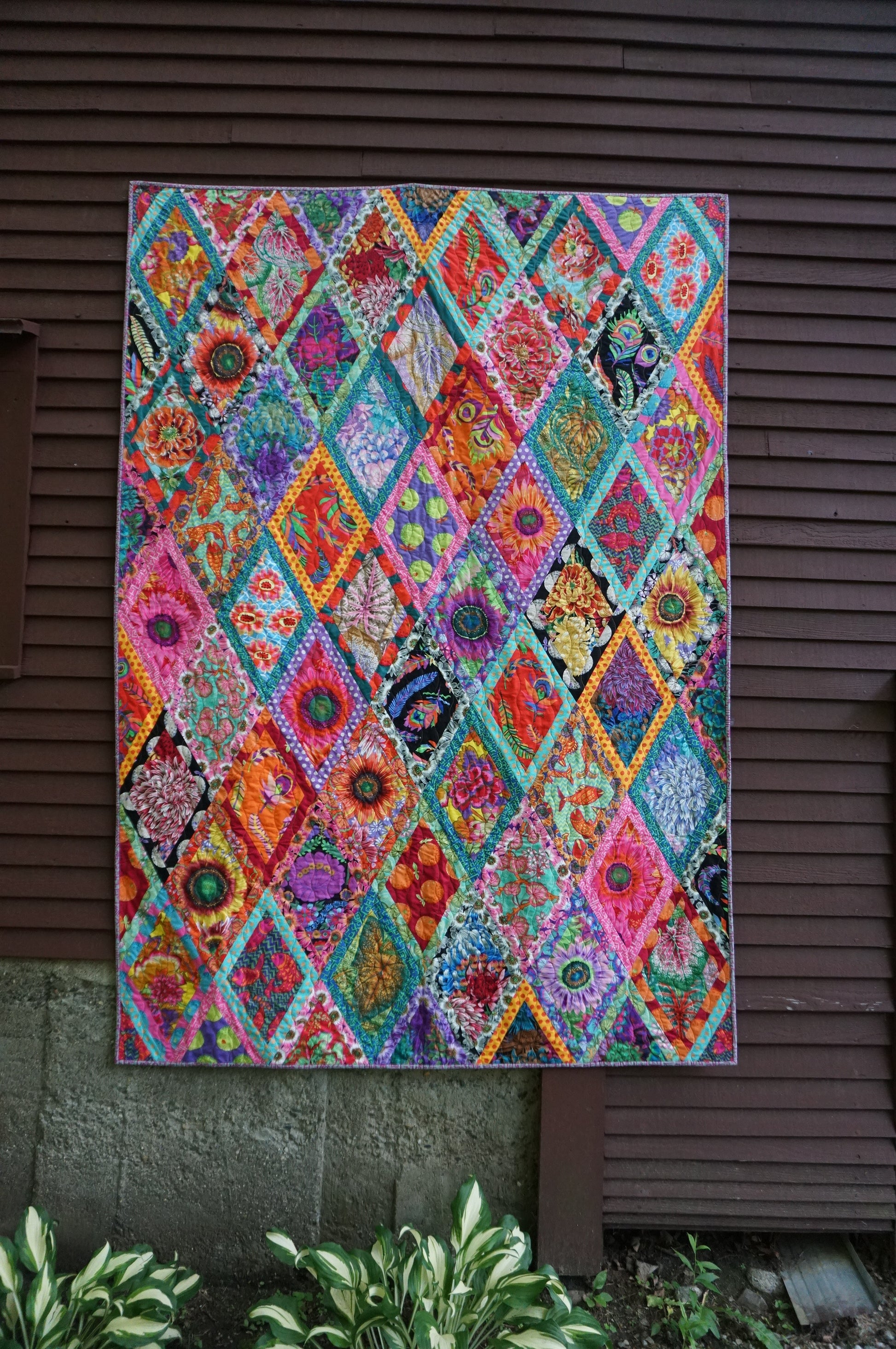 a kaffe quilt using bright Bright by kaffe Fassett collective fat quarter fq fabric layout orange pink and more available at 2 sew textiles art quilt supplie
