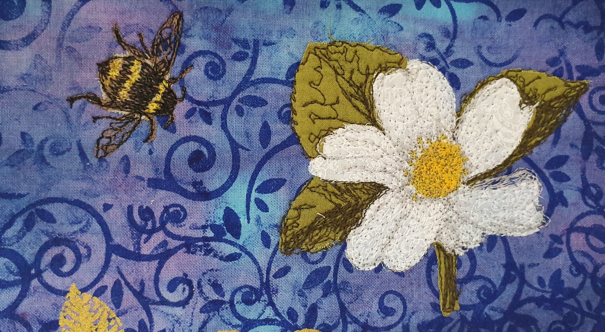 Bee and flower finished product example Sulky Stick 'n Stitch is ideal for Art Quilting, Hand Embroidery, Cross Stitch, Punch Needle, and Quilting. It is as easy to use as 1-2-3! Print or copy your design onto a Stick 'n Stitch sheet, at 2 Sew Textiles art quilt supplies